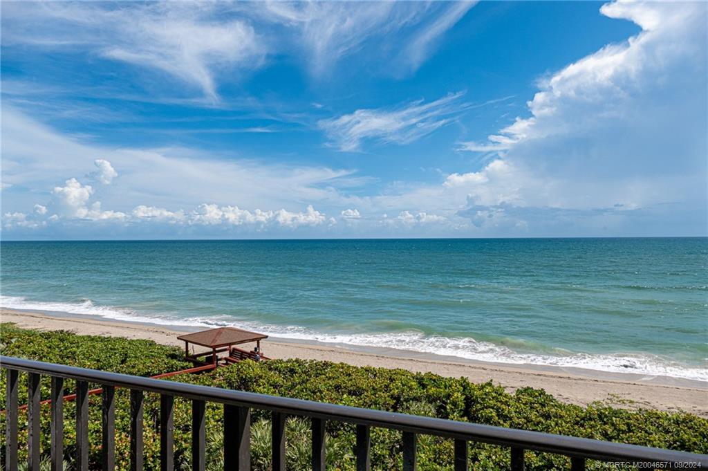 a view of ocean from a balcony