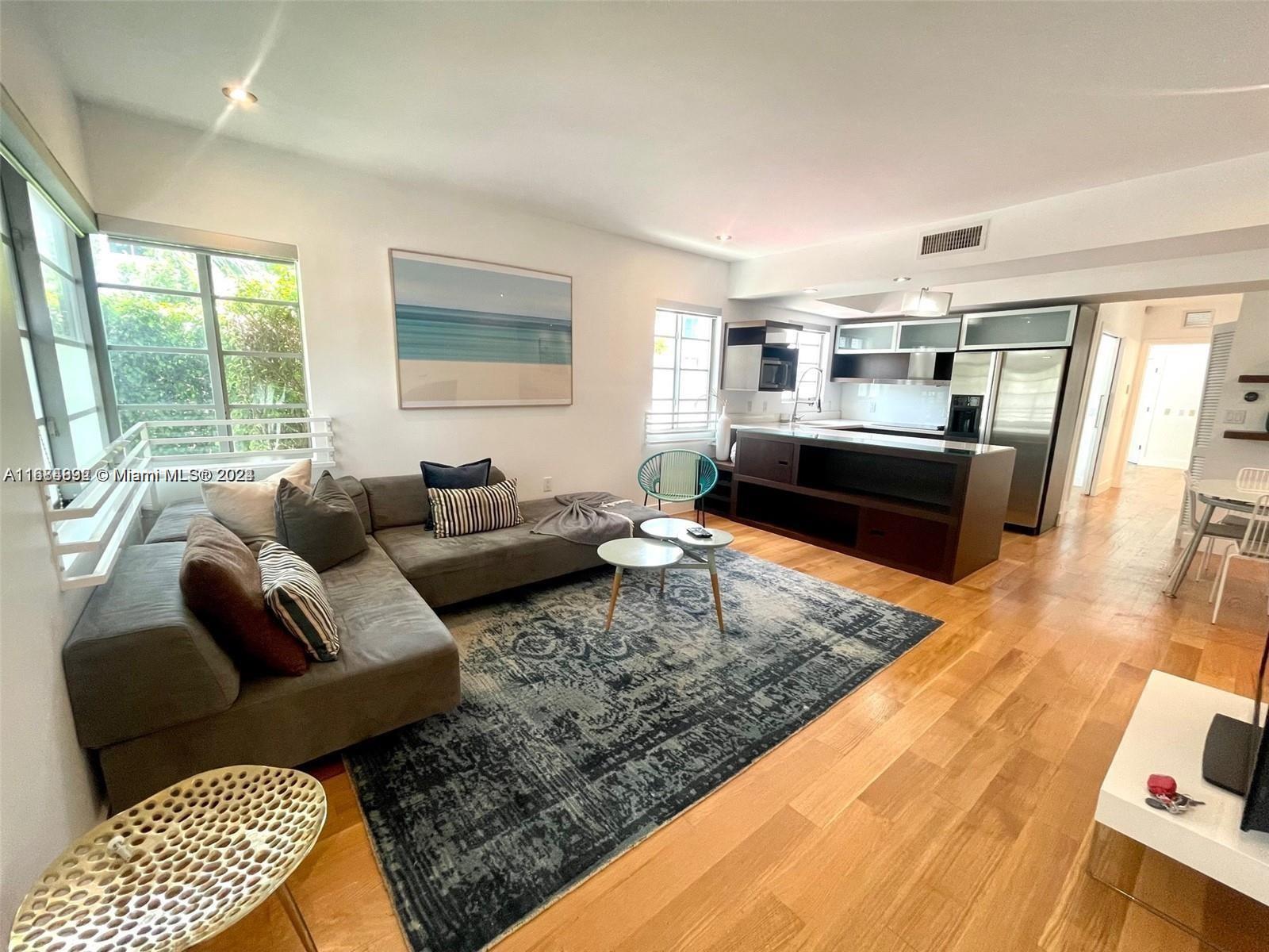 a living room with furniture and a couch