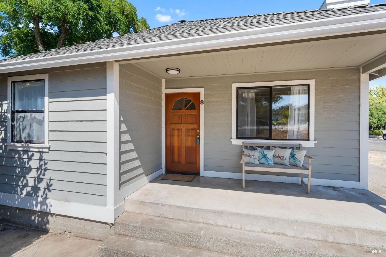 a view of house with outdoor space and seating space