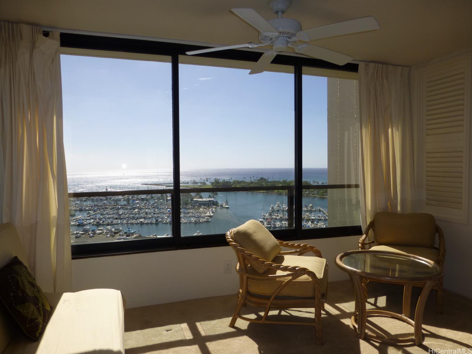 a view of a balcony with chairs