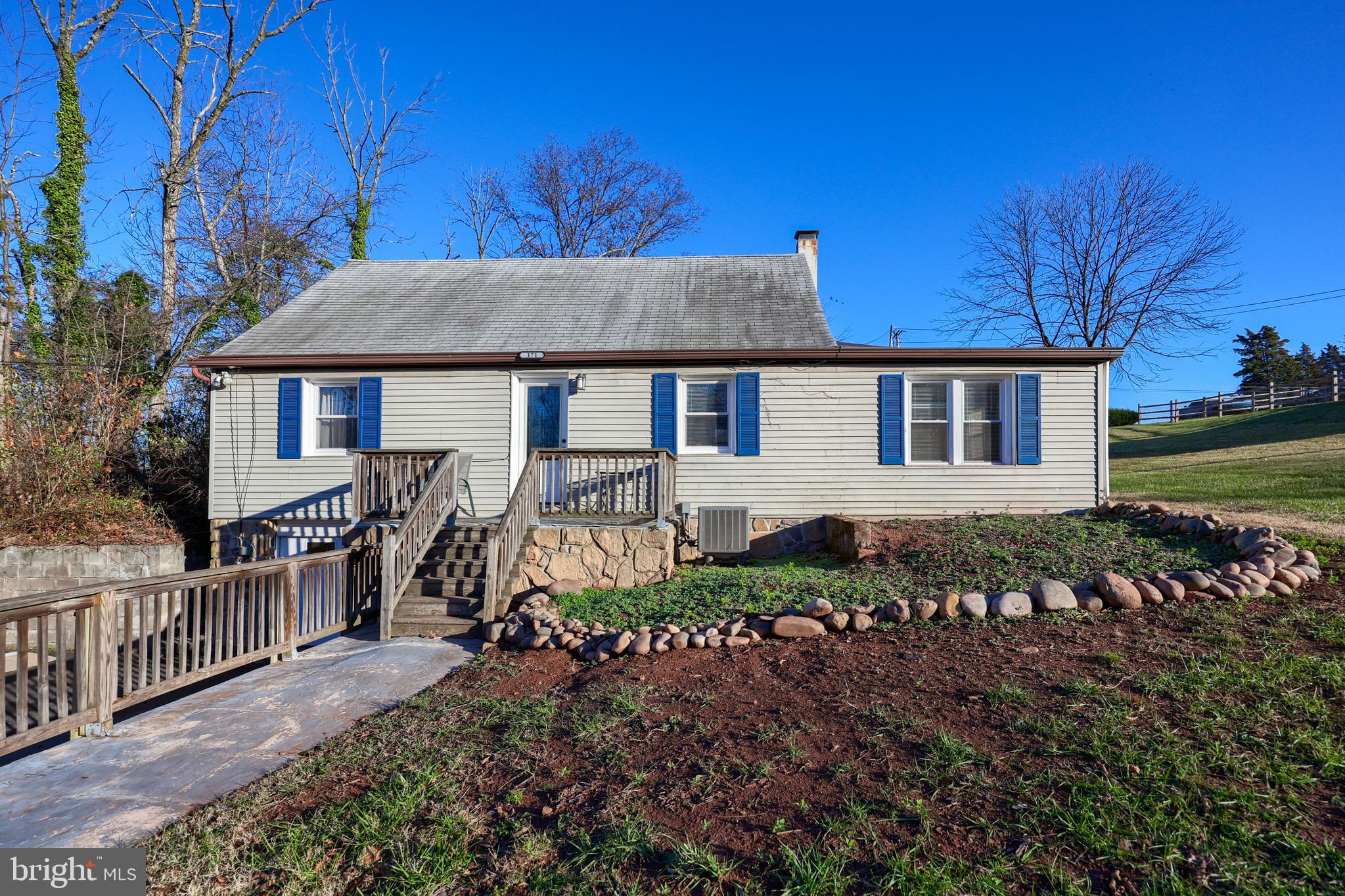 a house view with a garden space