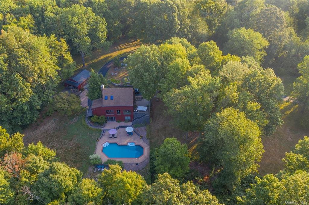 Welcome to 48 Apple Hill Drive, an oasis of 5.86 acres.