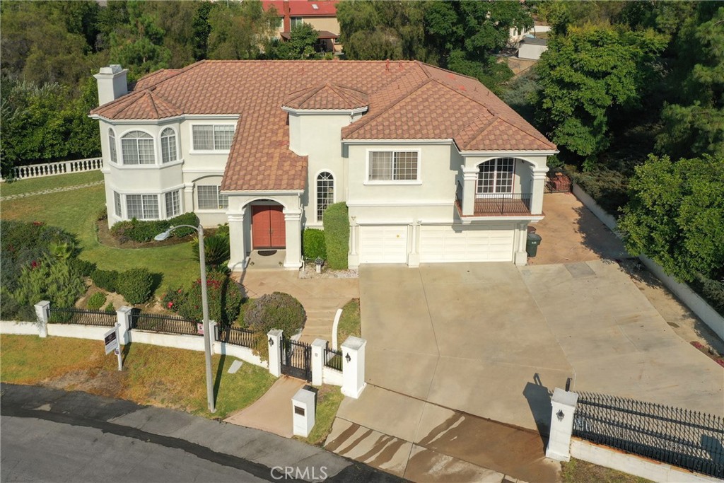 a aerial view of a house with garden