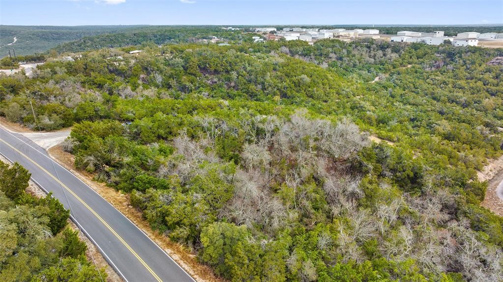 a view of a forest from a balcony