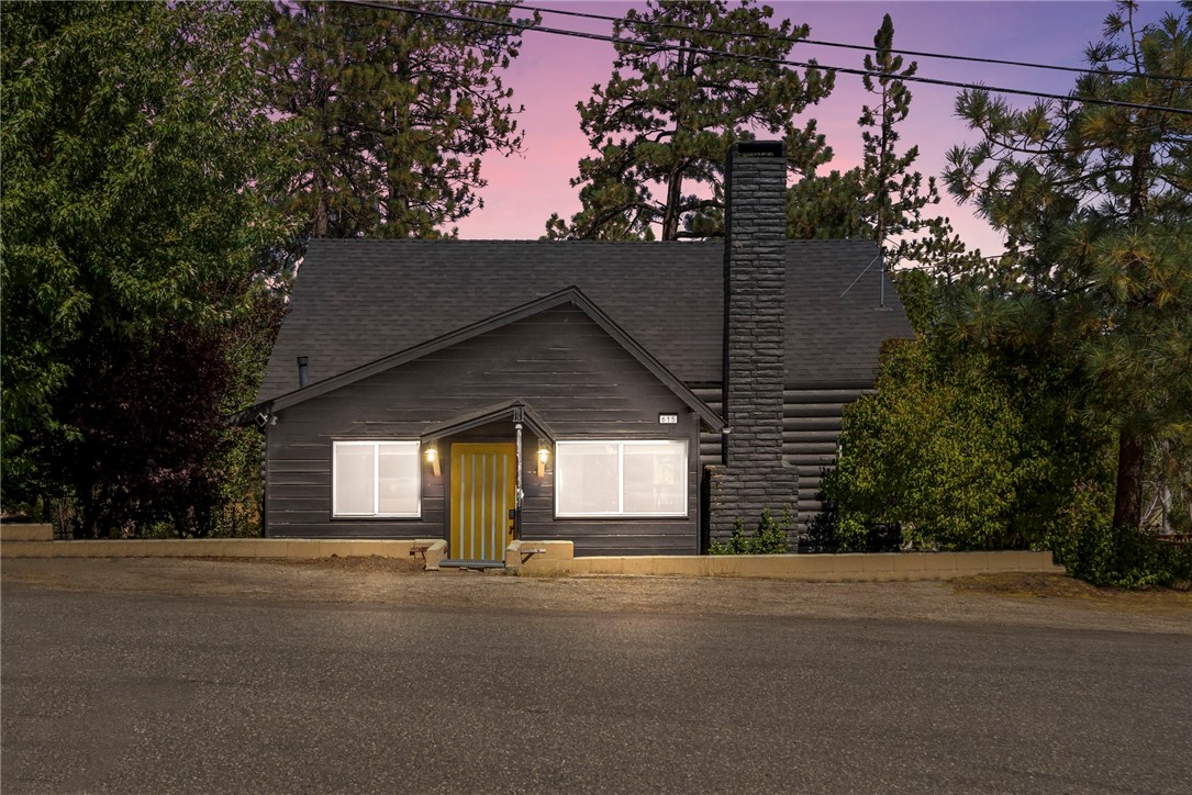 a view of a house with a street