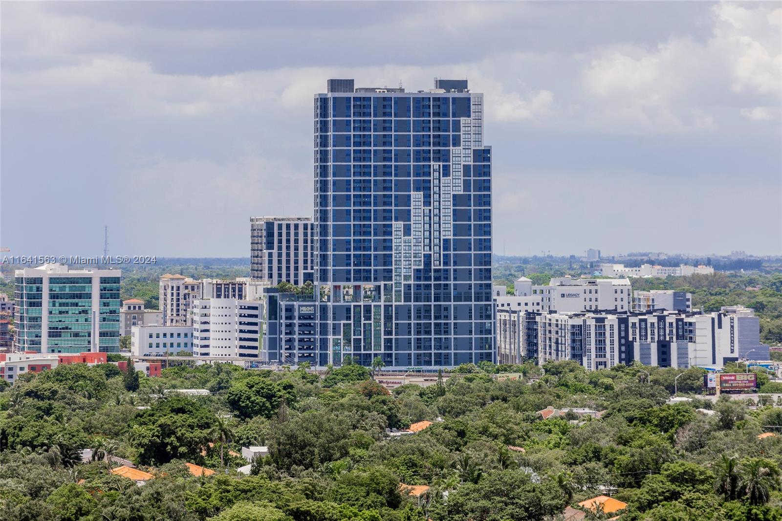 a view of a city with tall buildings