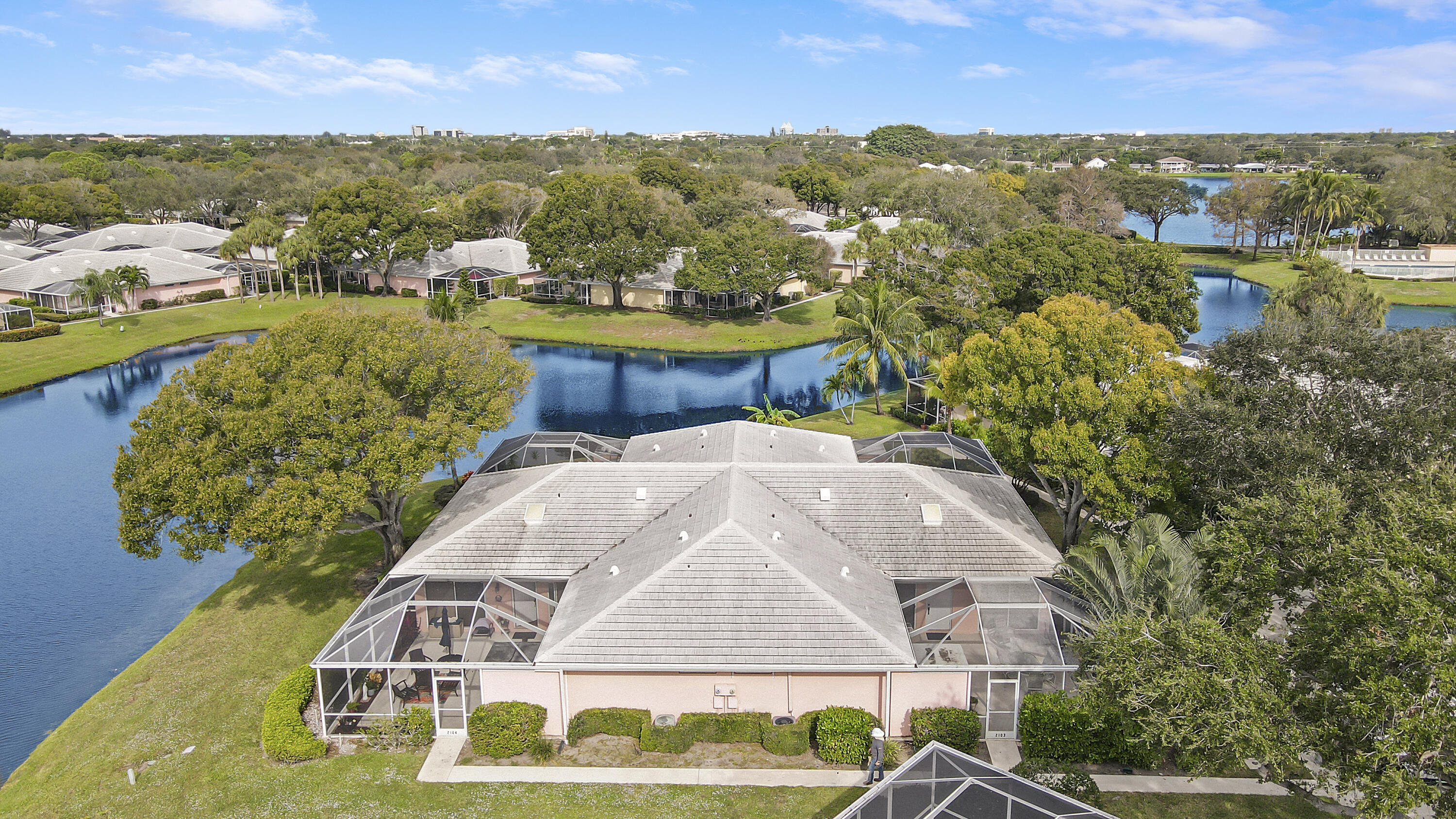 a view of a swimming pool with a yard