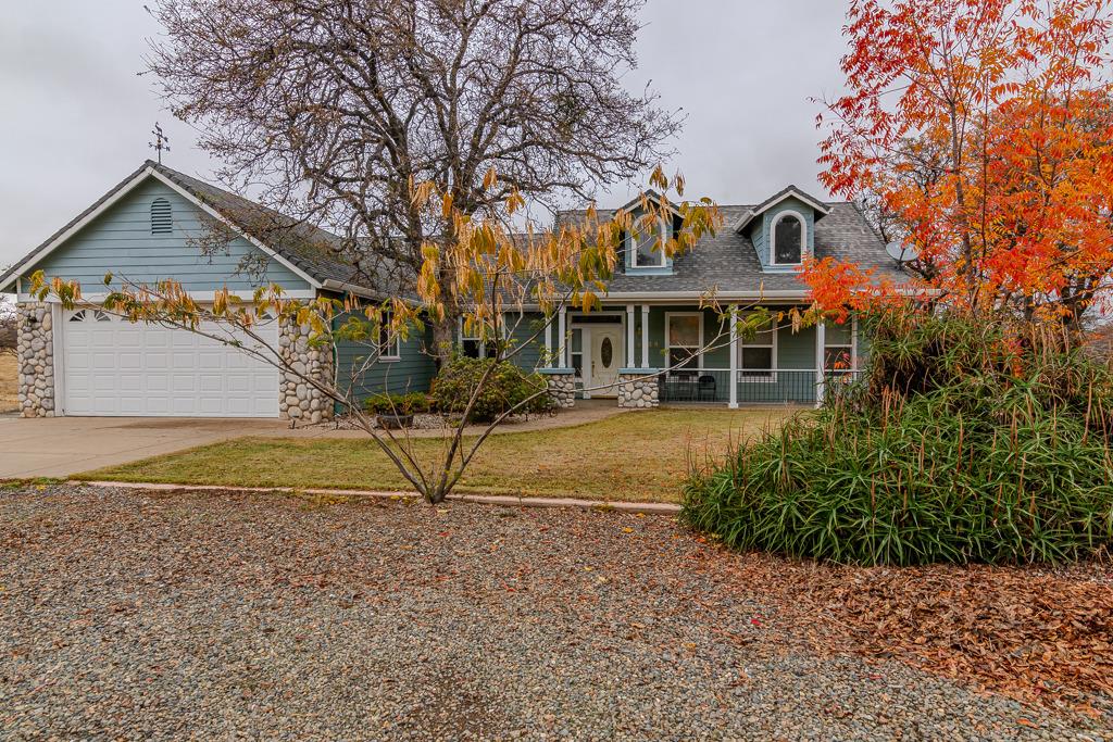 a view of house with outdoor space