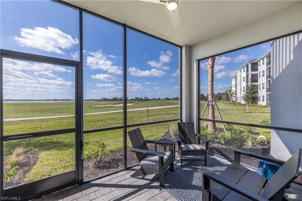 a view of a room with lounge chairs in the balcony