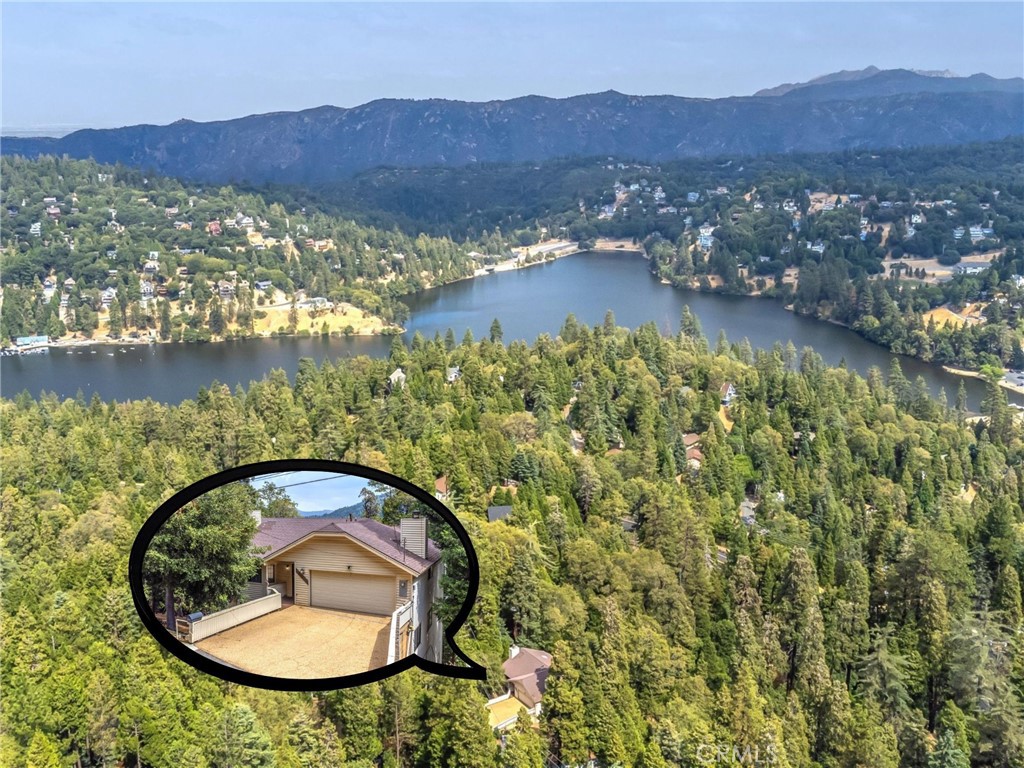 an aerial view of lake residential house and outdoor space