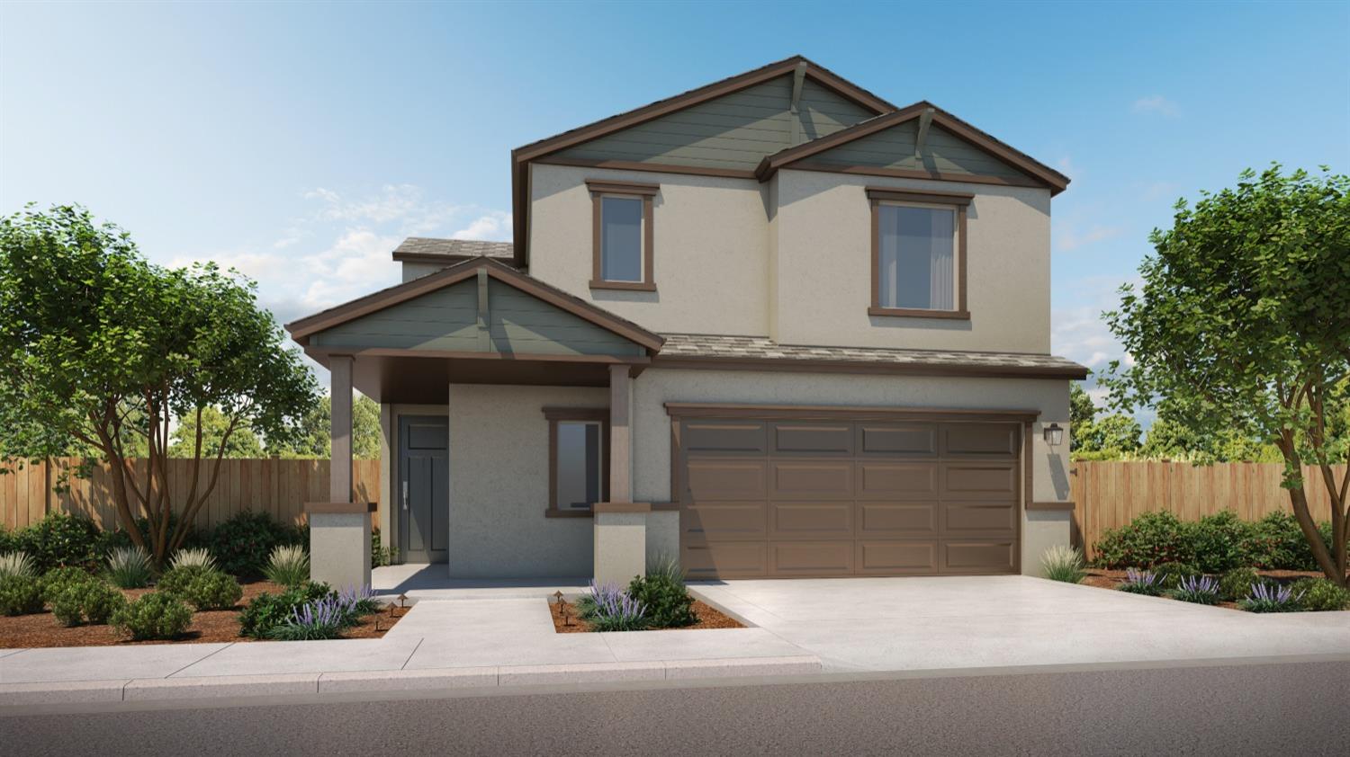 a front view of a house with garage