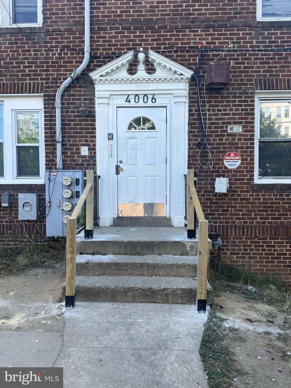 a front view of a building with entryway