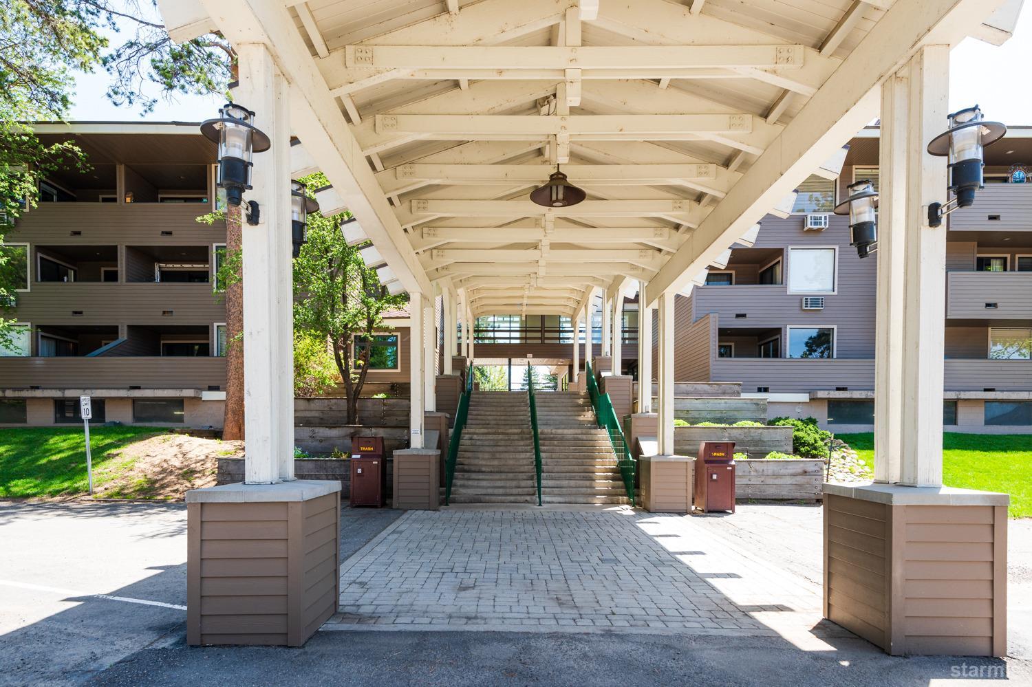 a front view of a building with a porch