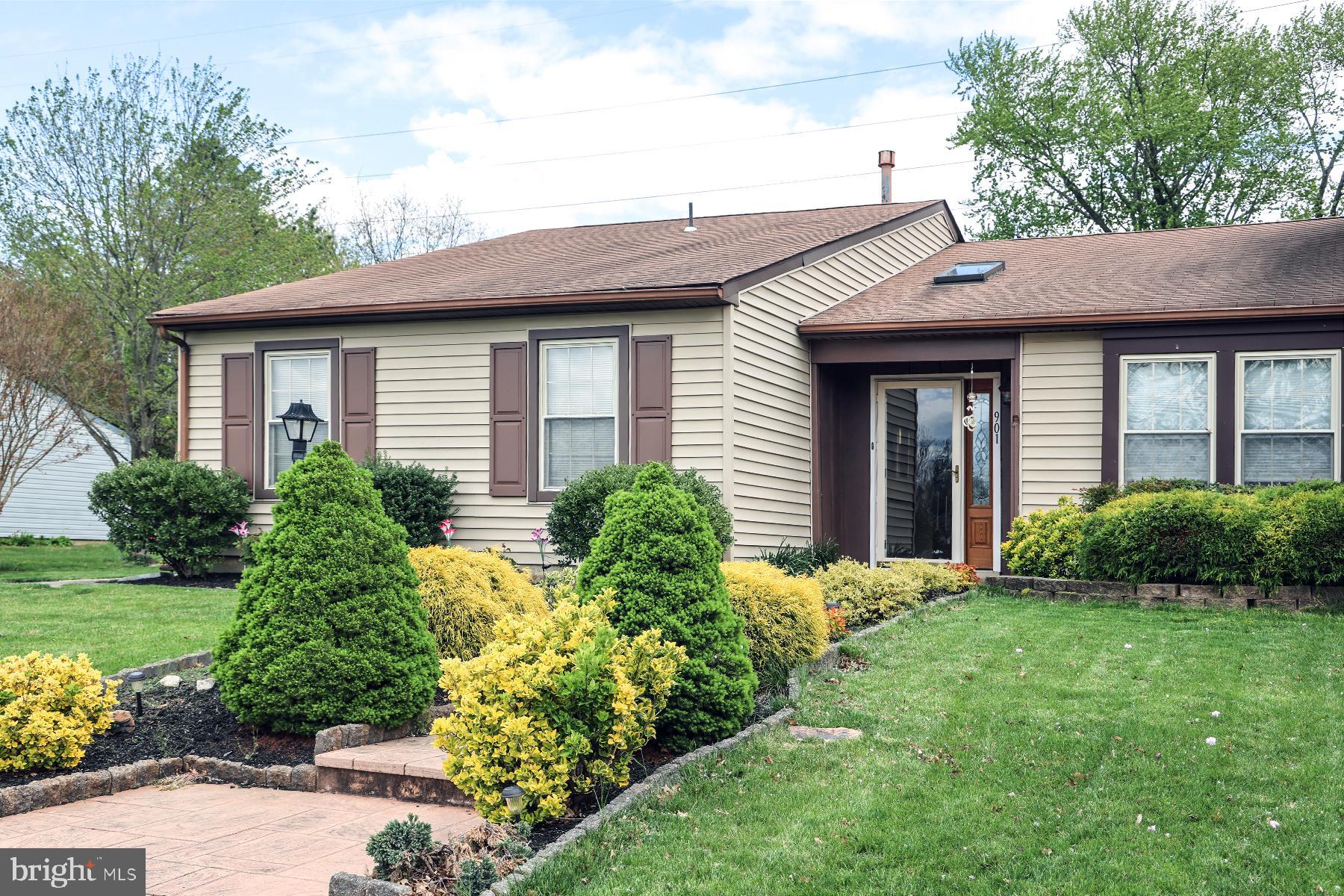 a view of a house with garden