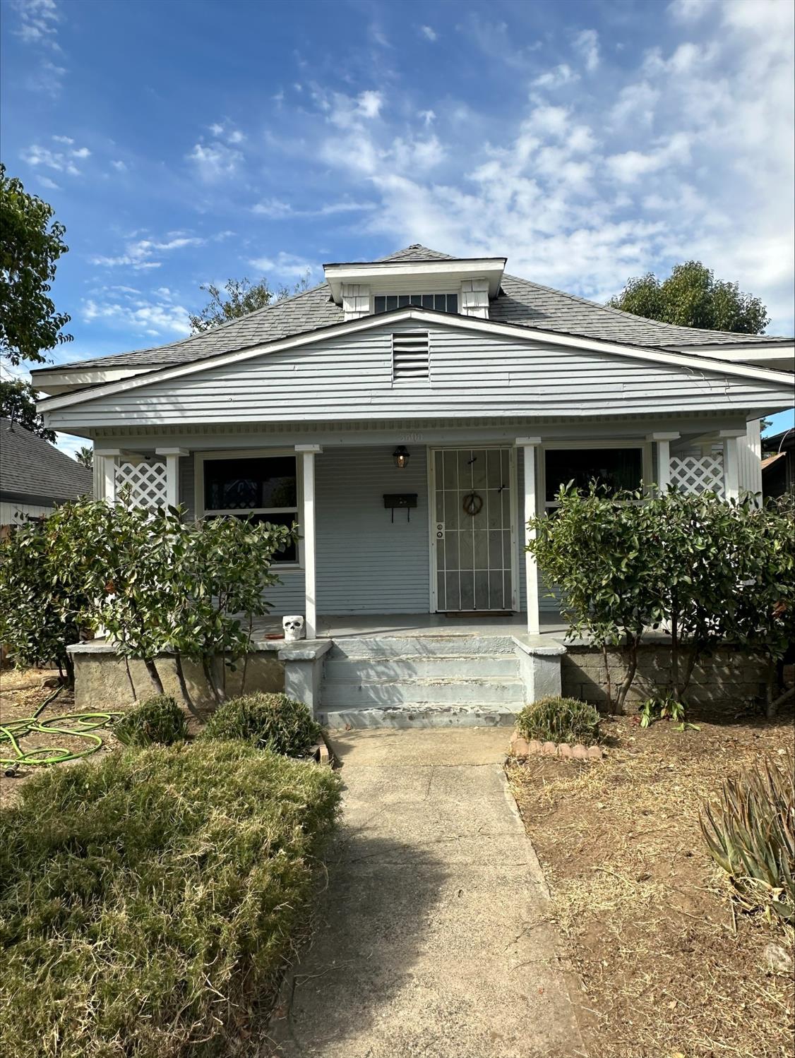 a view of a house with a patio