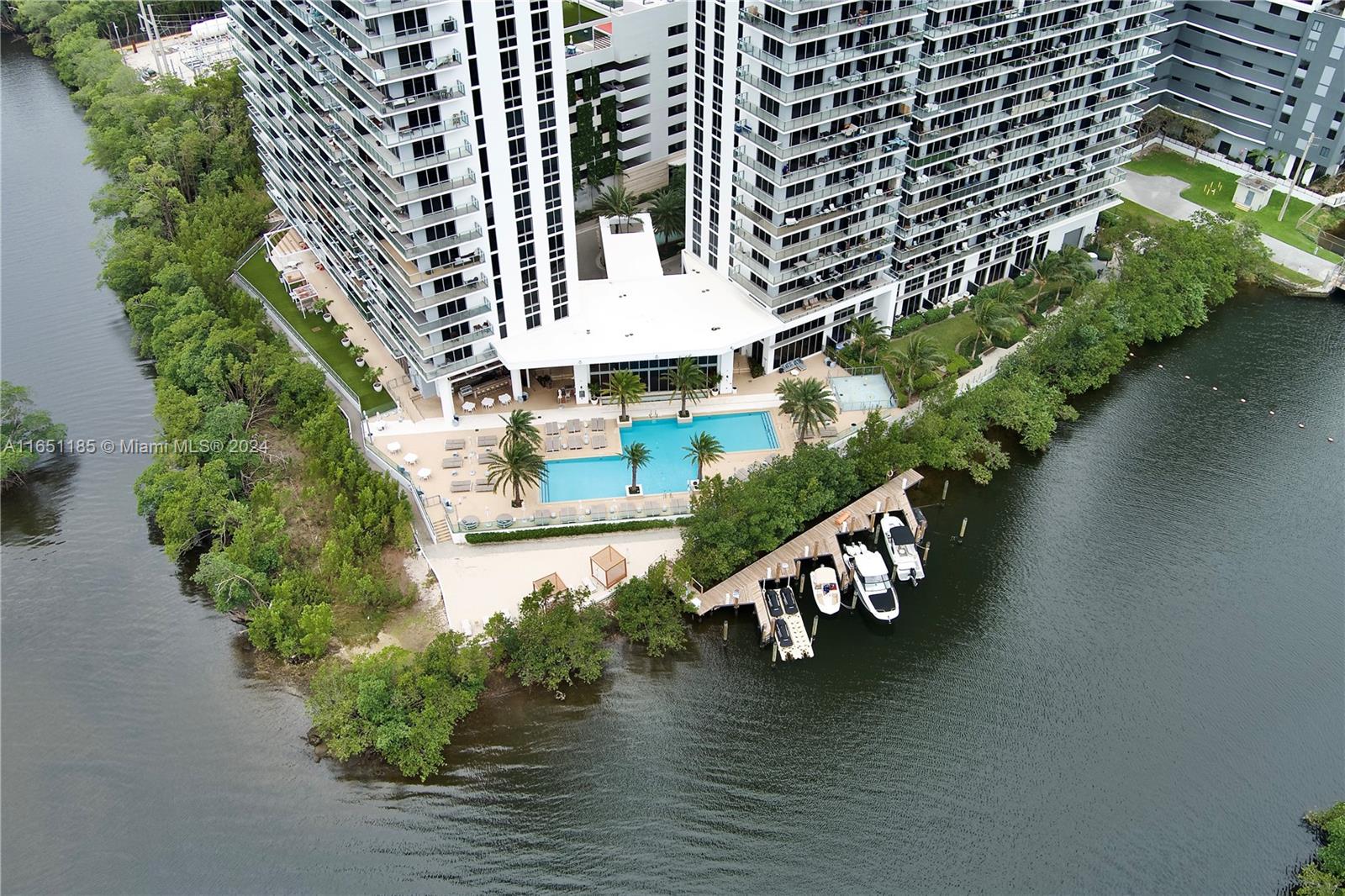 an aerial view of house with yard