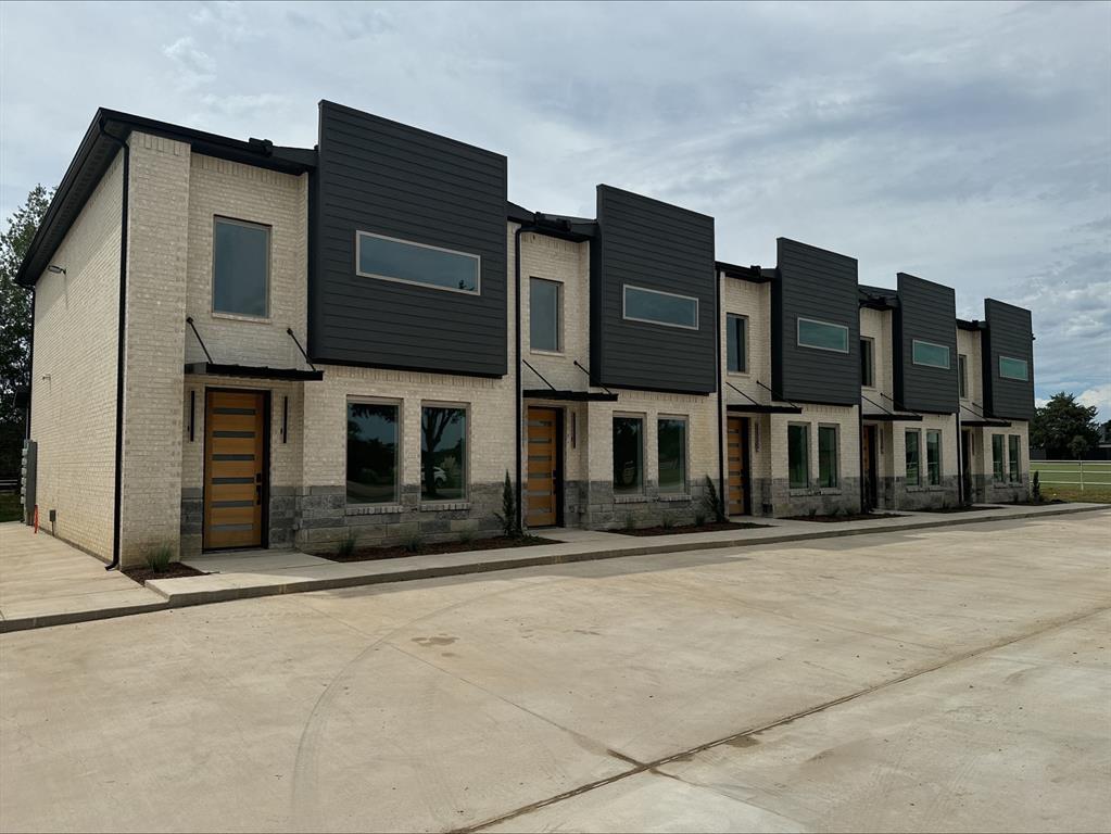 a front view of residential houses