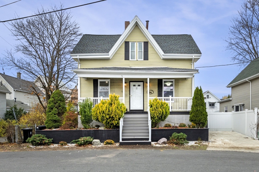 front view of a house with a yard