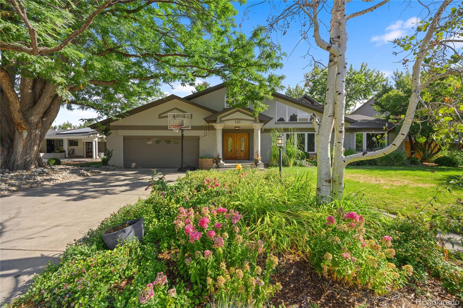 front view of a house with a yard