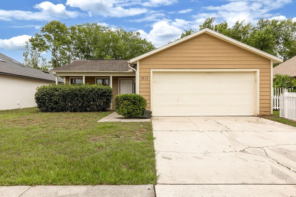 front view of a house and a yard