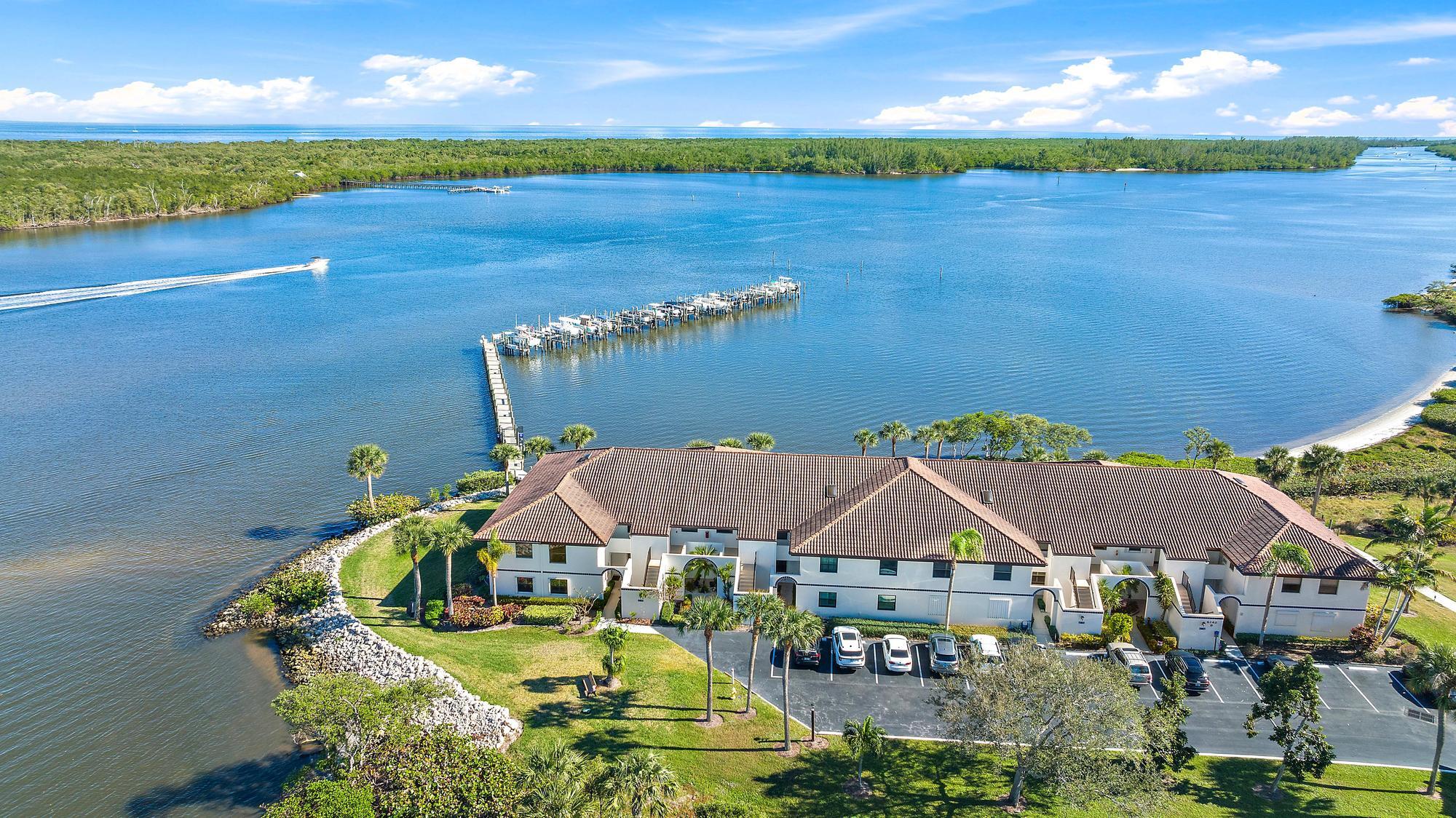 a aerial view of a house with a ocean view