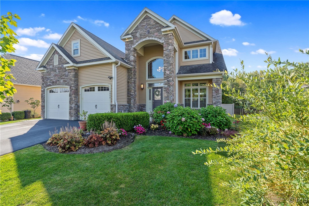 Fabulous curb appeal and beautiful landscaping