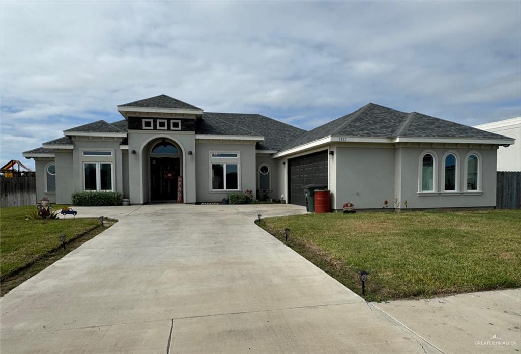 a view of outdoor space yard and front view of a house