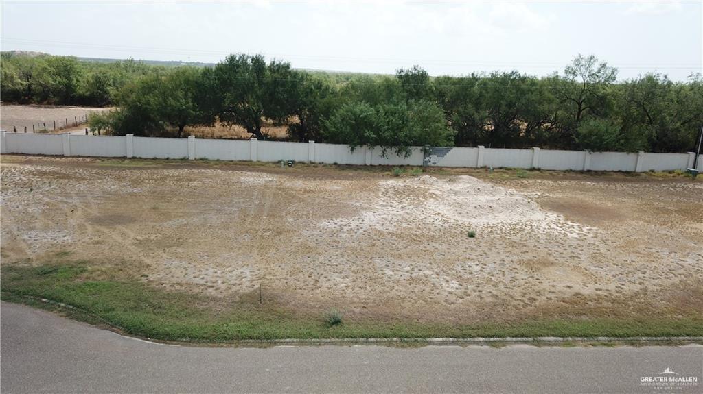 a view of swimming pool with a yard