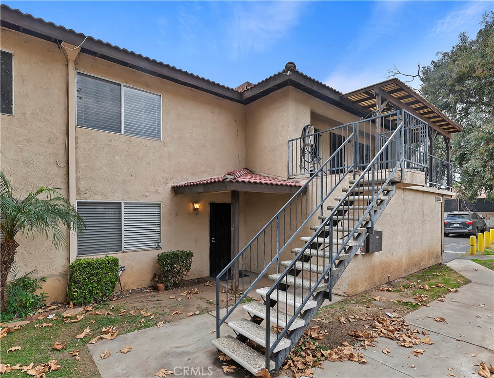 a front view of a house with a balcony