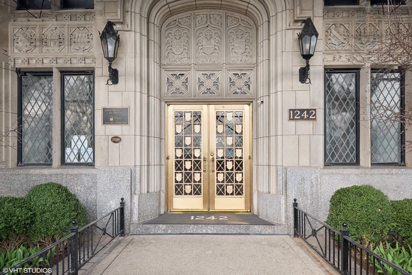 a view of a entryway door front of a house