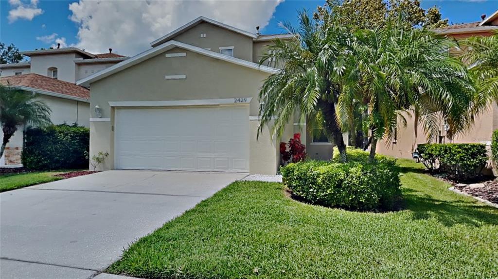 front view of house with a yard