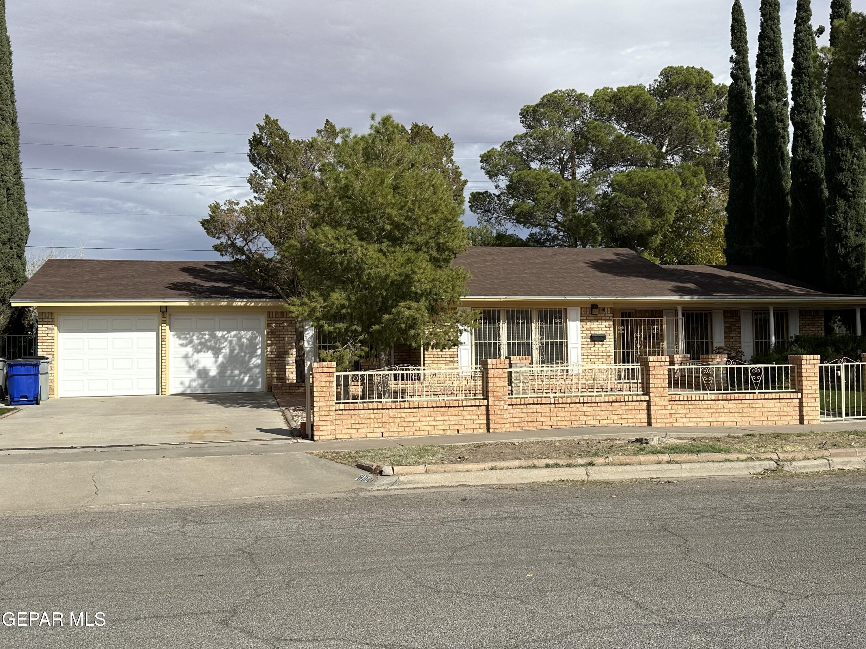 a house with trees in front of it