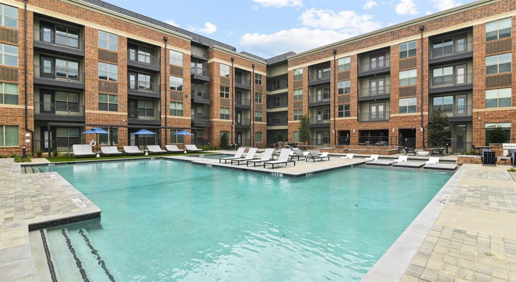 a view of pool with outdoor seating