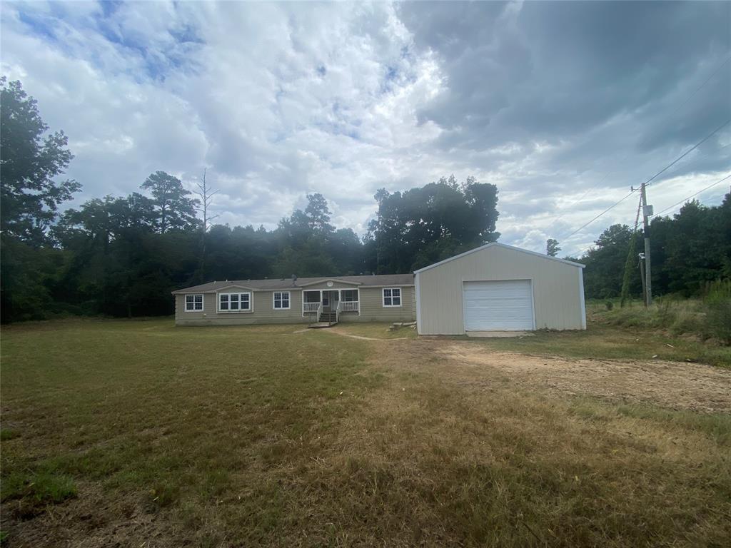 a view of outdoor space and yard