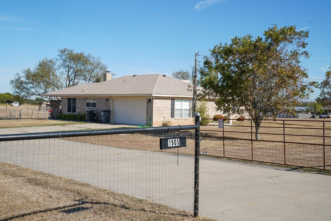 front view of a house with a street