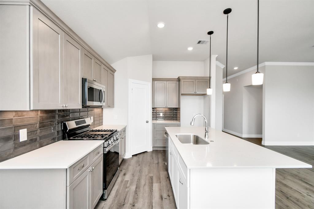 Open concept kitchen with kitchen island