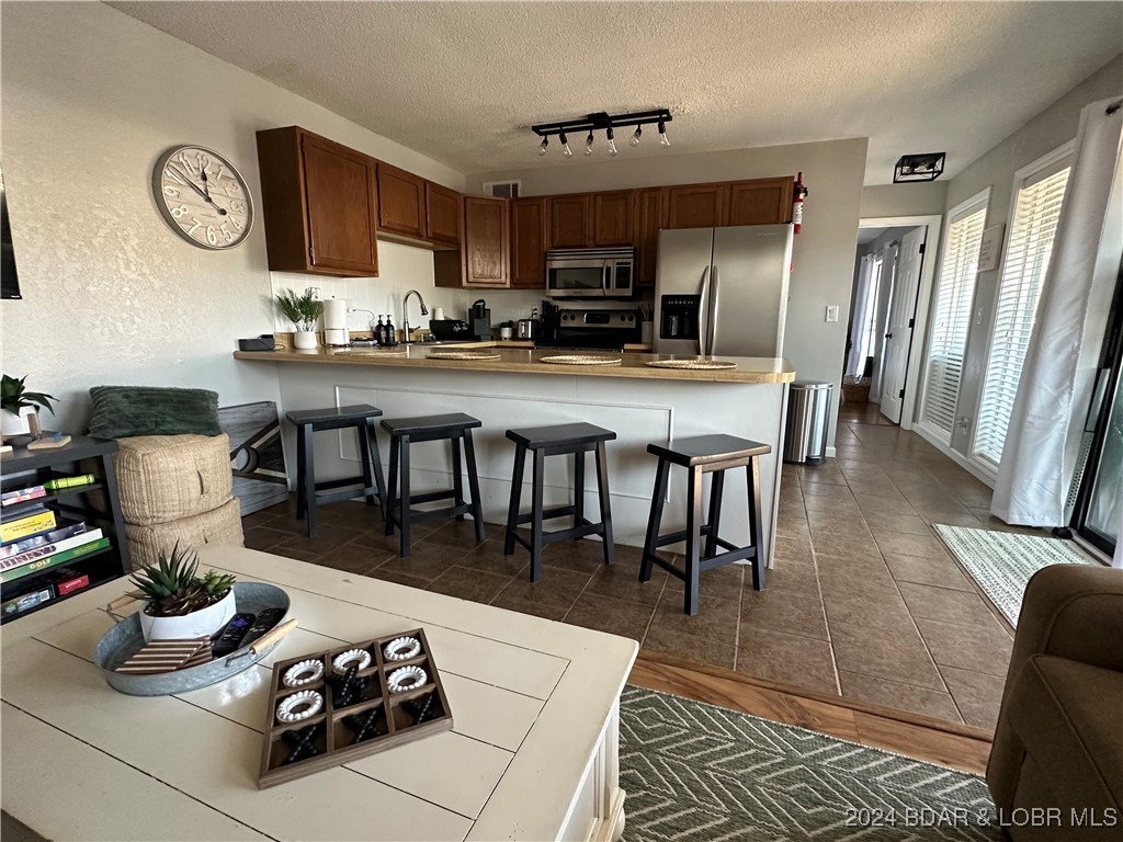 Open concept family room to the kitchen with tons