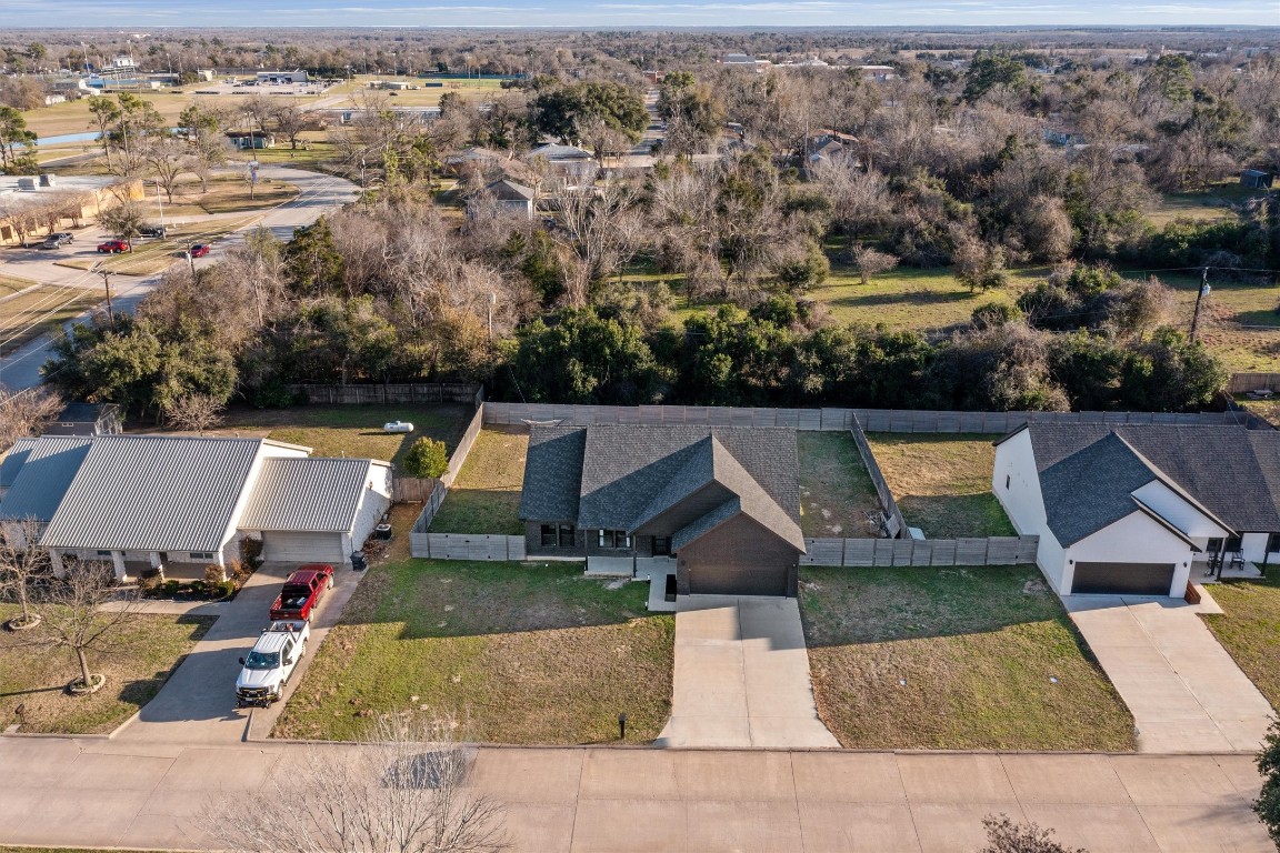 an aerial view of a house with a garden