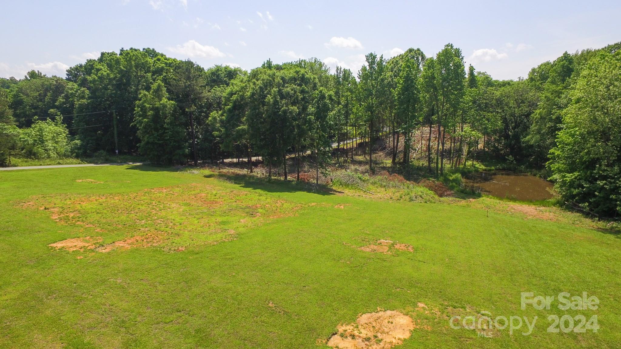 a view of a lake view with a big yard