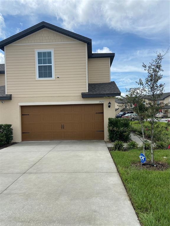 a front view of house with yard