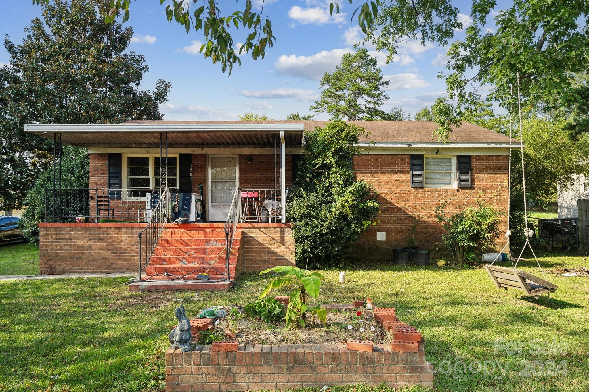 front view of a house with a yard