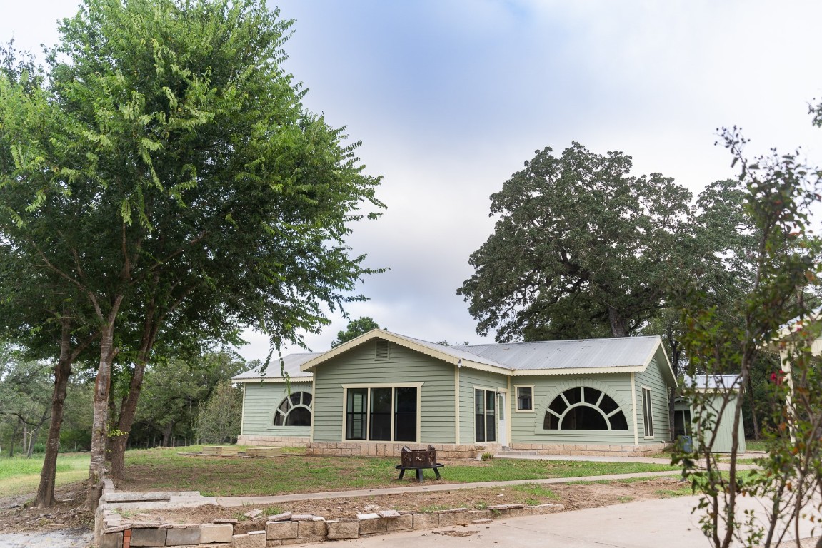 a view of house with a outdoor space