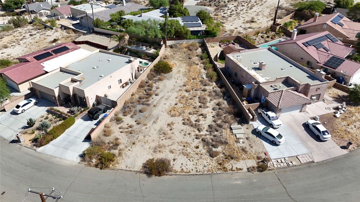 an aerial view of a house with a outdoor space