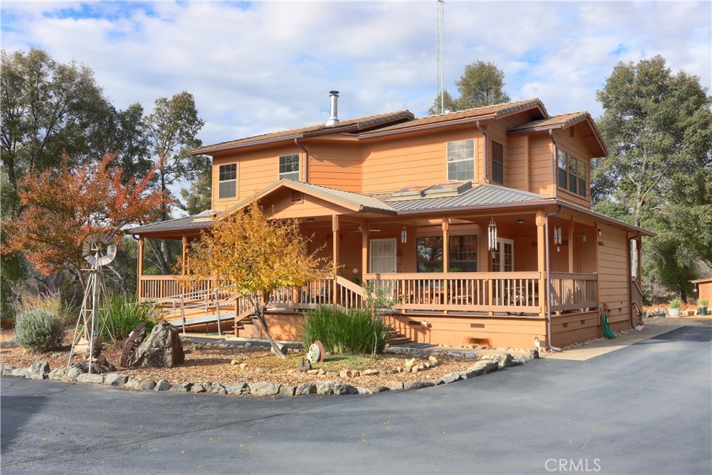 a front view of a house with a outdoor space