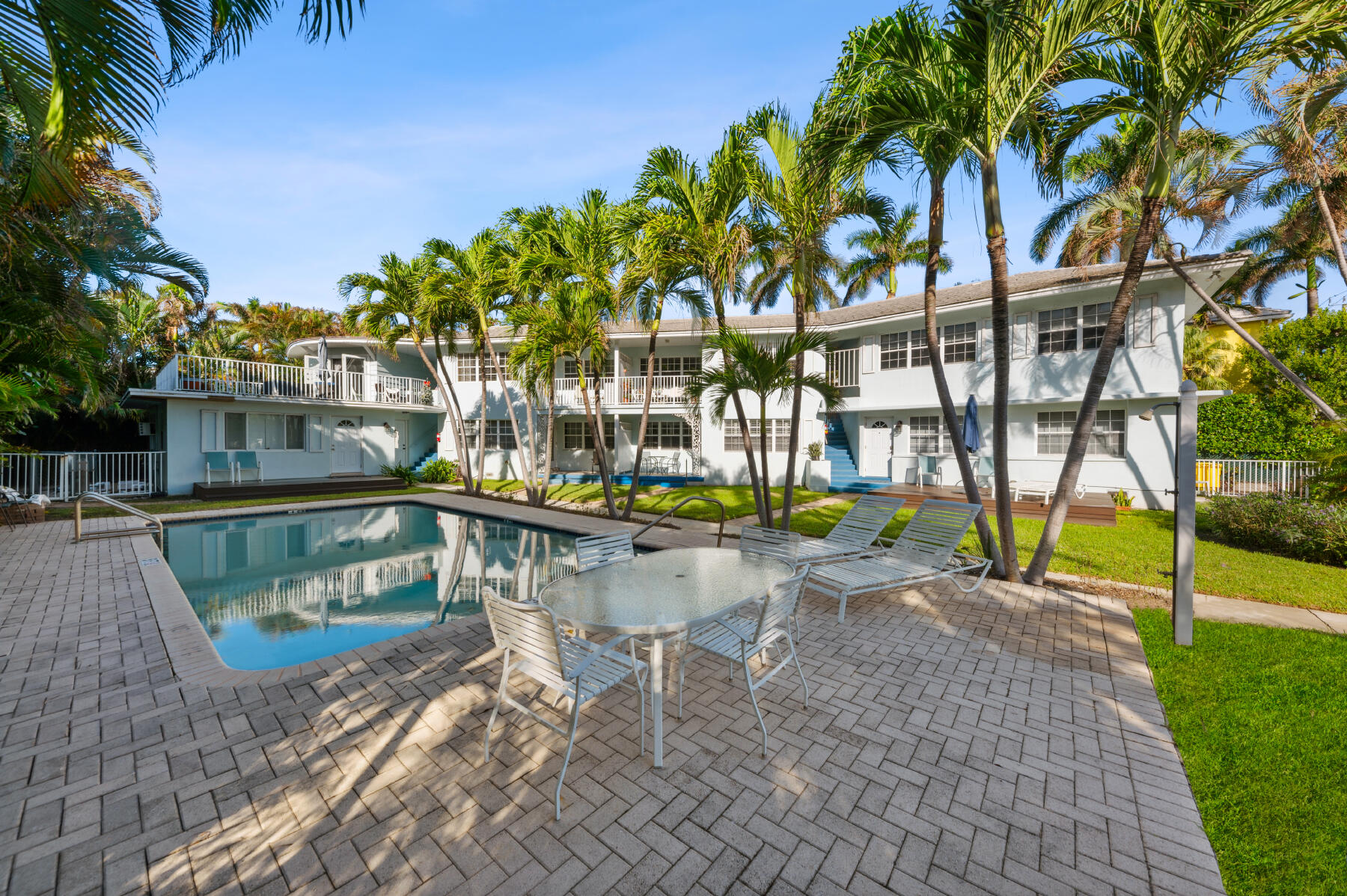 a view of swimming pool with chairs