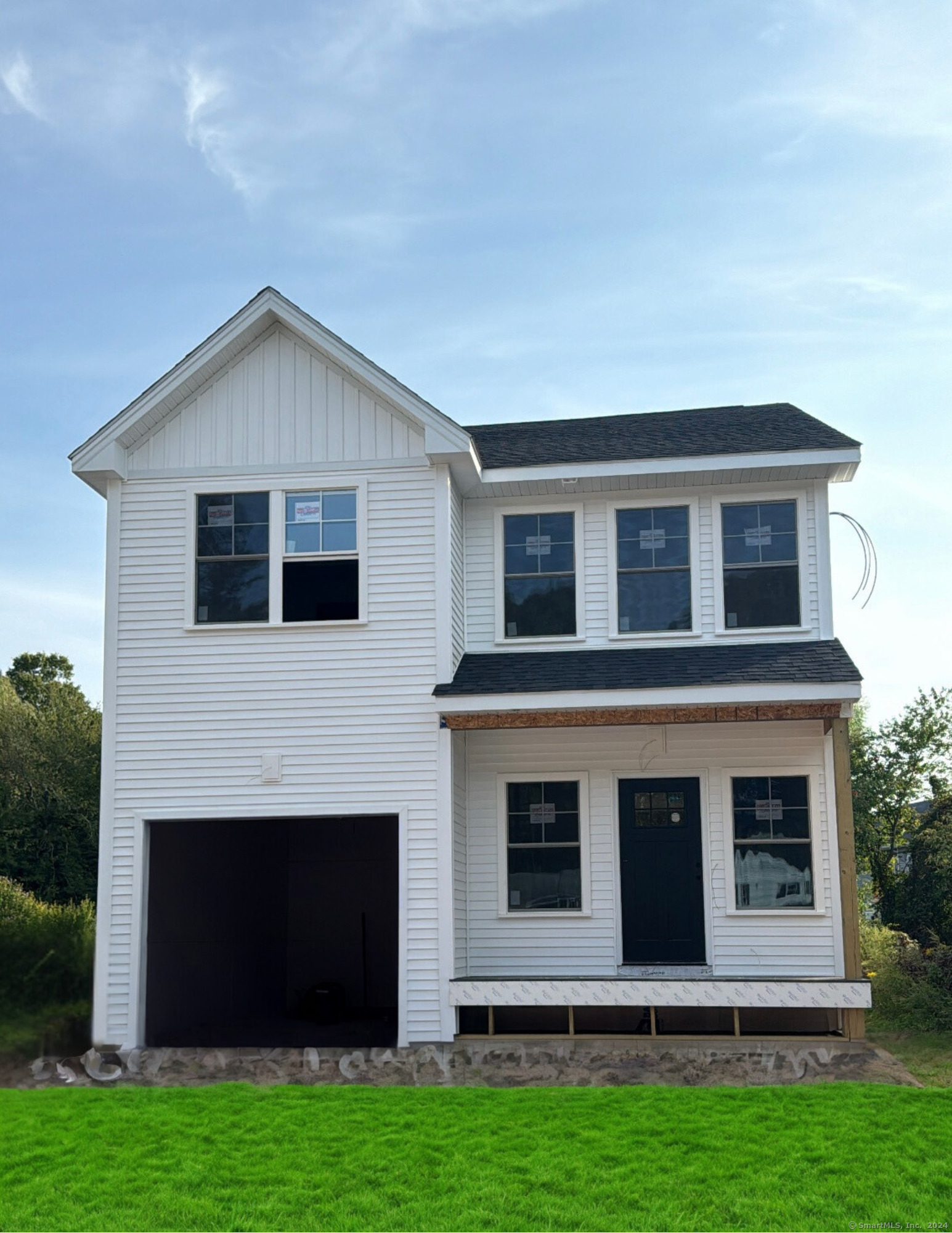 a view of a house with yard