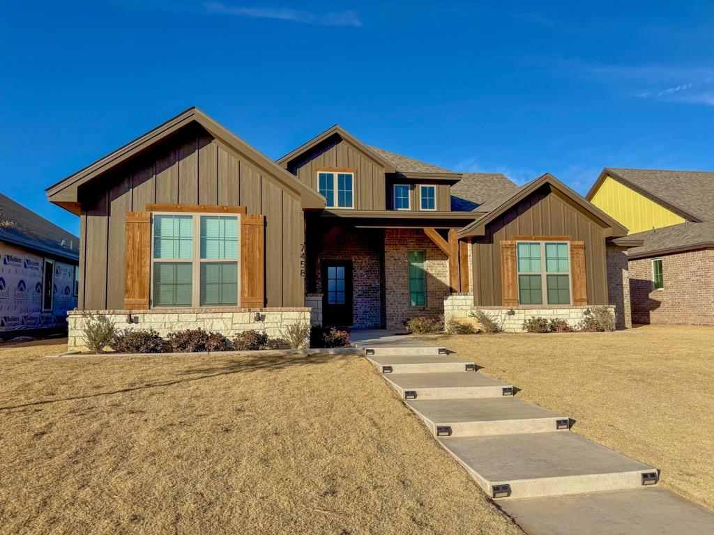 a front view of a house with a outdoor space