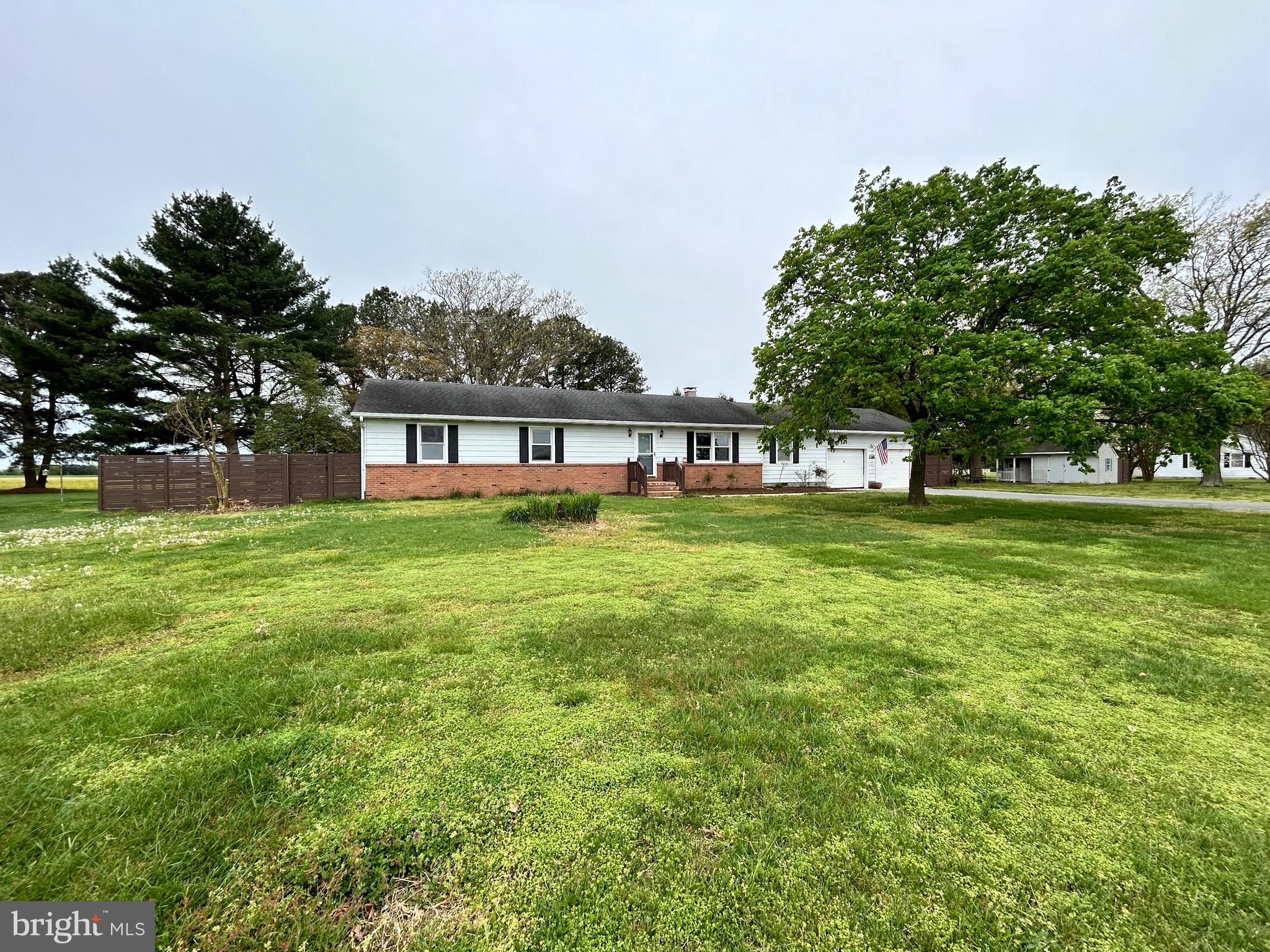 a view of a house with a big yard