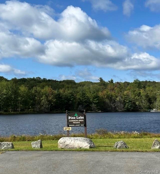 a view of a lake with a yard