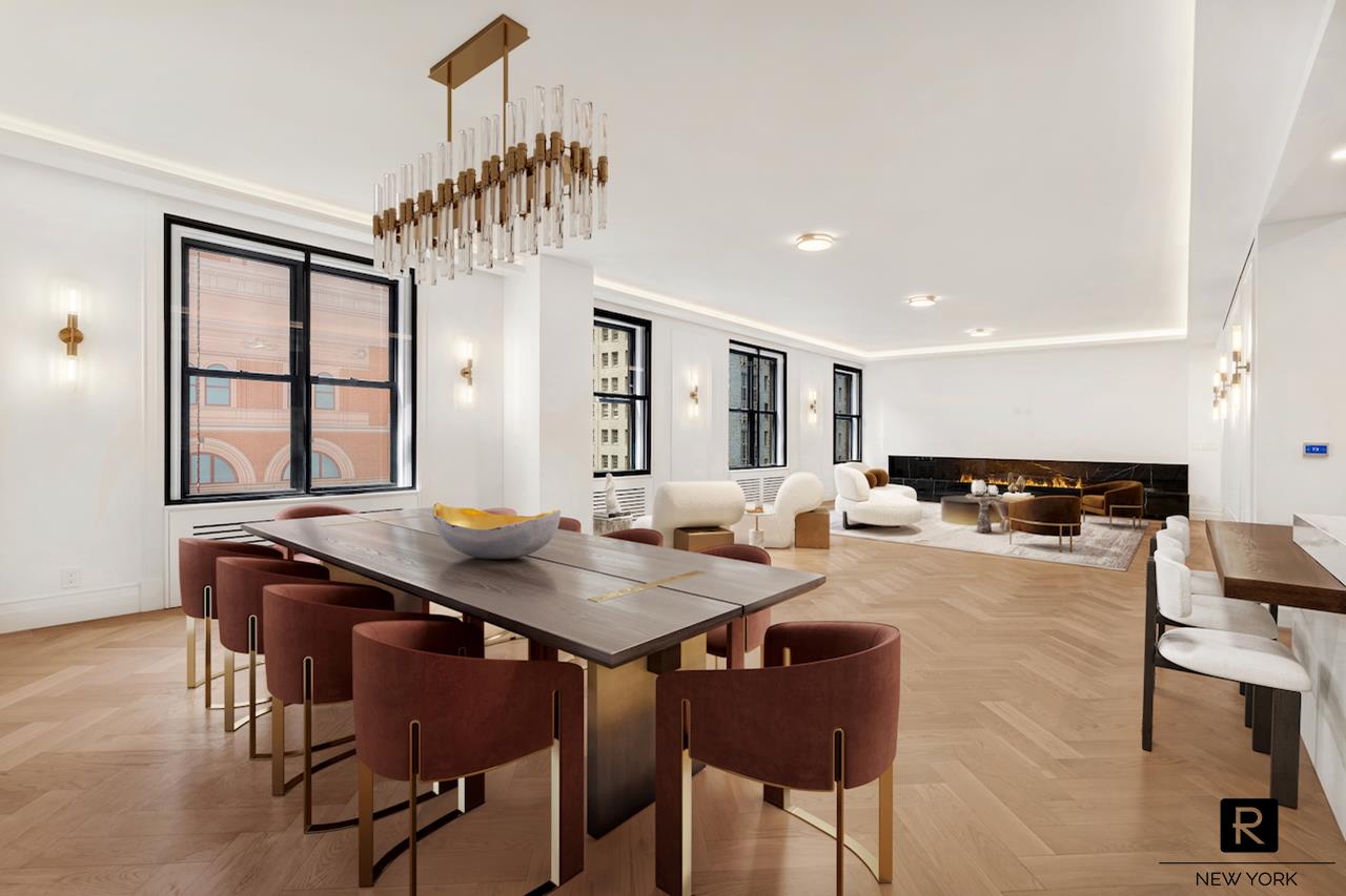 a view of a dining room with furniture and a chandelier